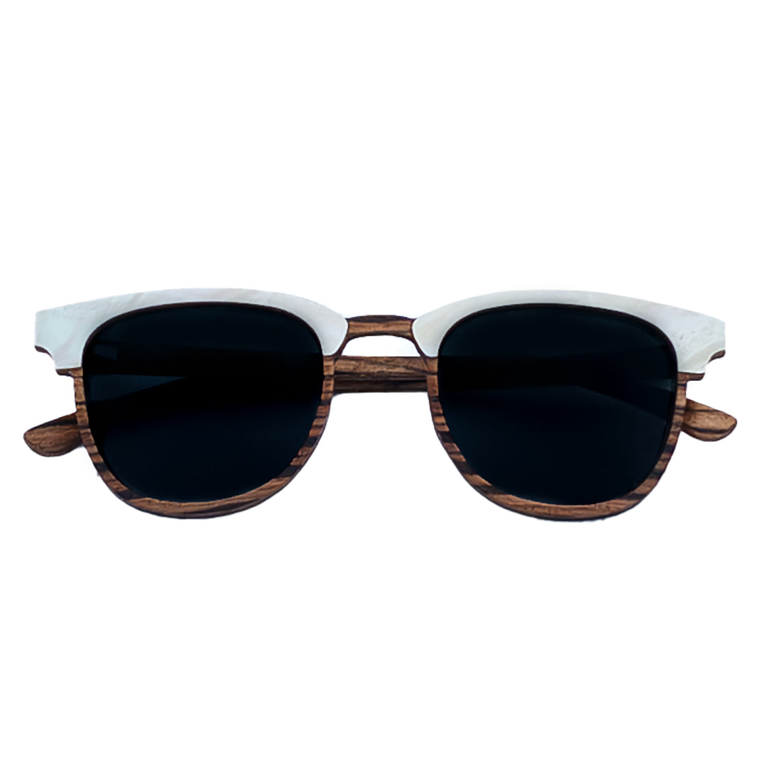 Soul California Eyewear Pebble Beach Pearl sunglasses front view crafted from zebra wood and genuine mother of pearl with polarized black lenses.